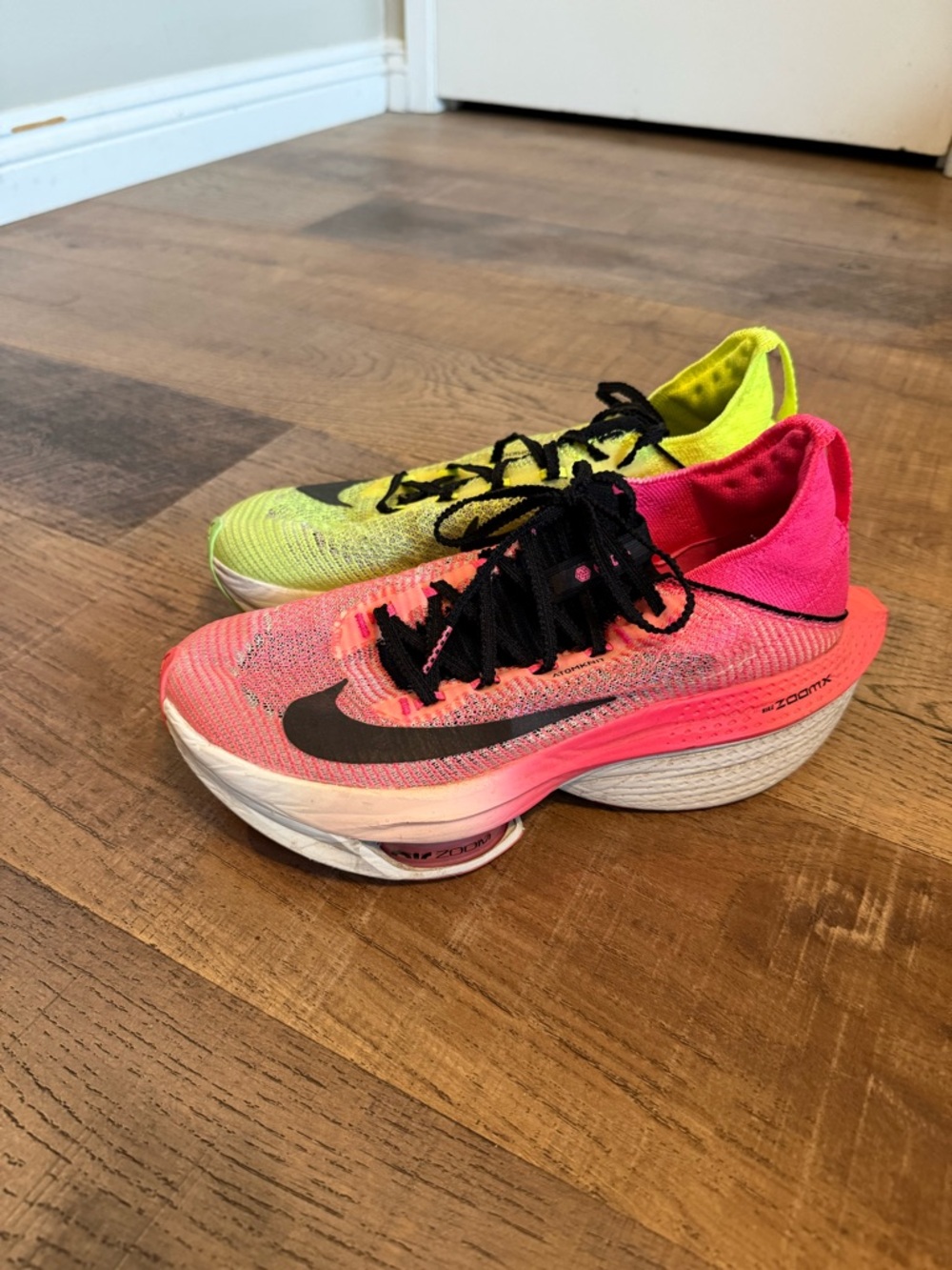Nike Dual-Color Alphaflys Running Shoes in Hot Pink and Neon Yellow